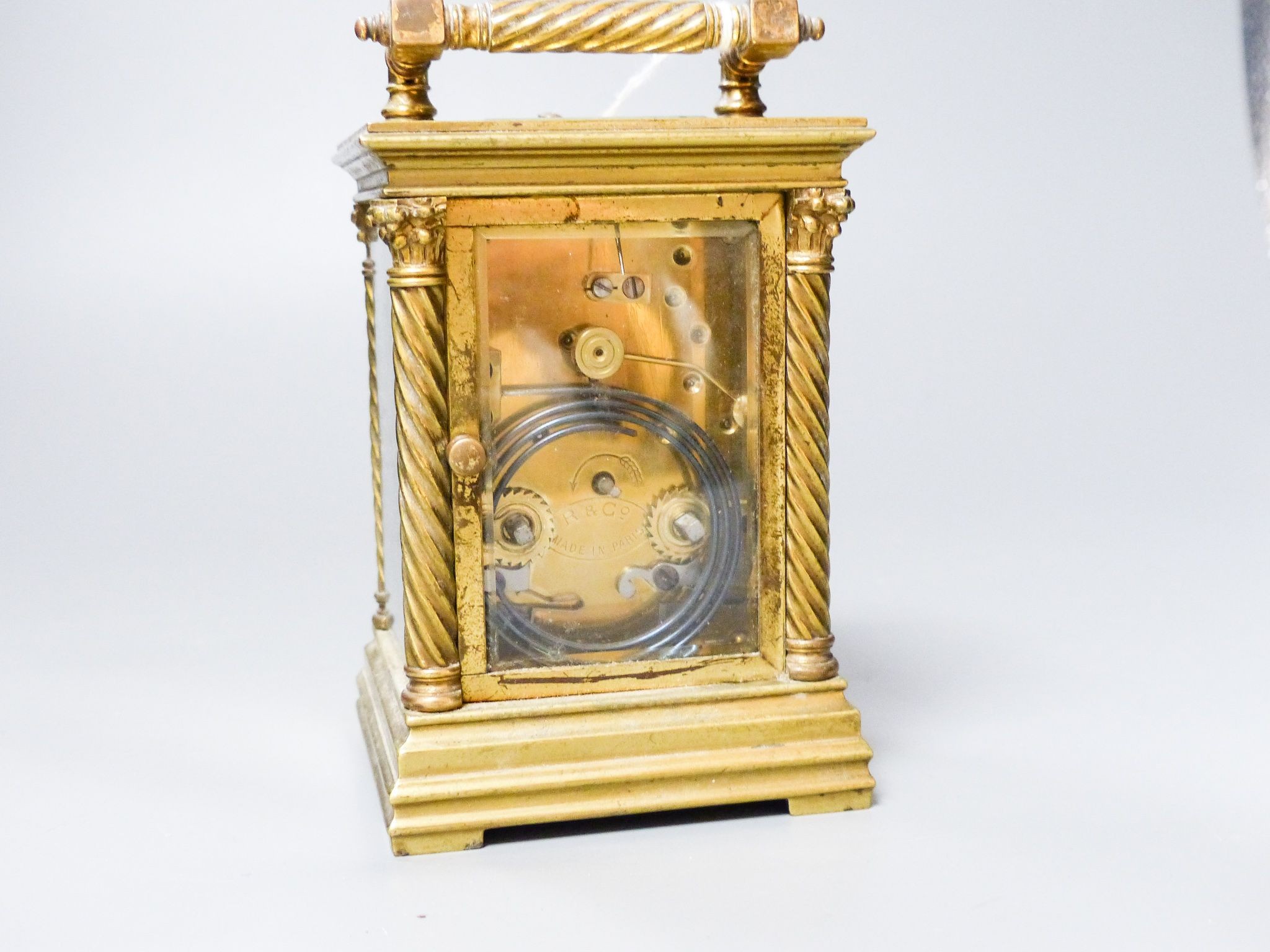 A French brass repeating carriage clock, c.1900, stamped R &Co. Paris, 15.5 cm high handle up